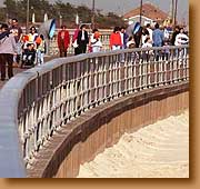 Railings and funnels on the boardwalk reflect the park's nautical theme